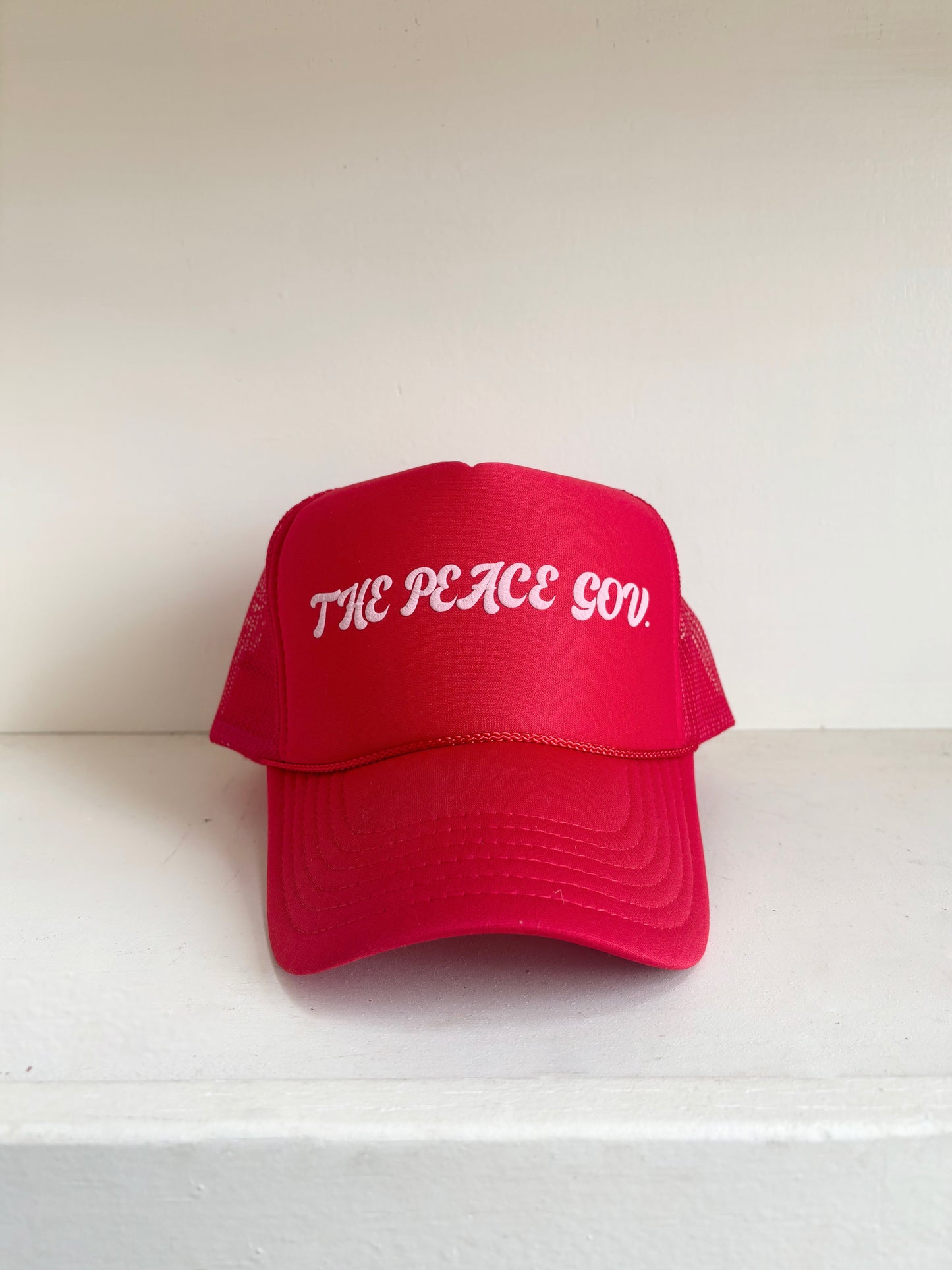The Peace Gov. Red Trucker Hat